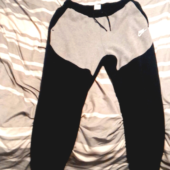 Nike tech Fleece joggers color is black and gray and size medium